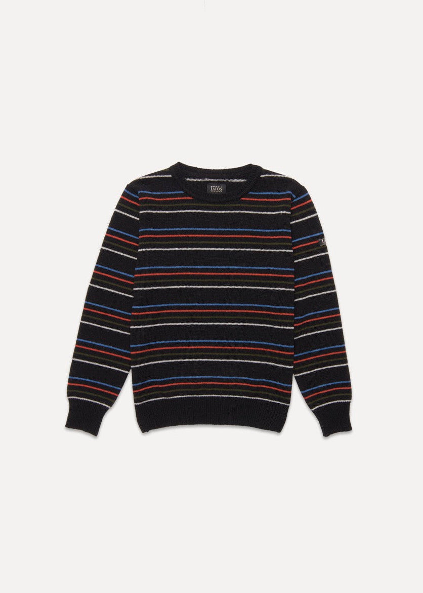 Jersey unisex negro de punto con rayas finas en colores vivos, fotografía en plano (flat lay), elaborado en Catalunya con hilo reciclado.