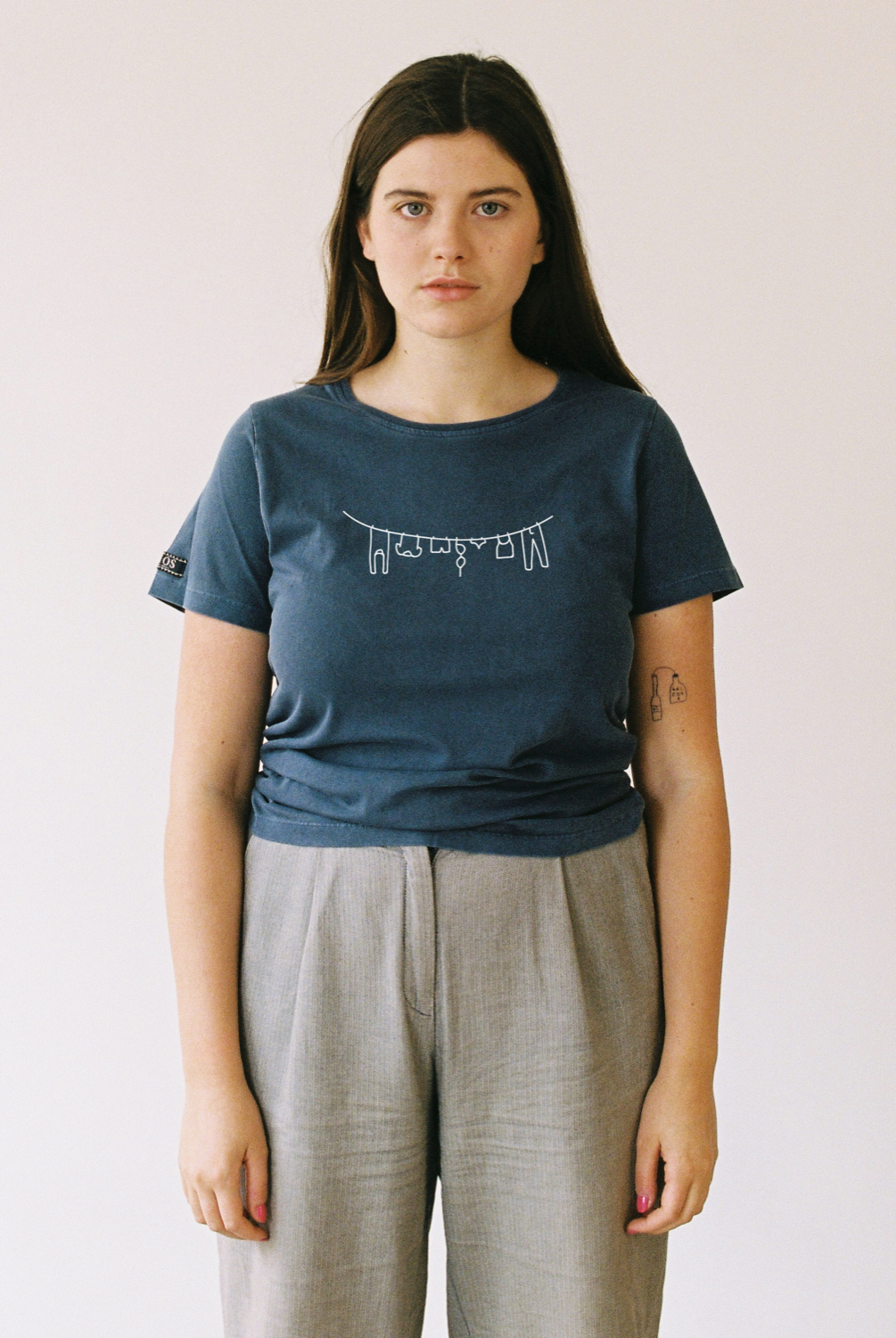 Camiseta - Roba estesa