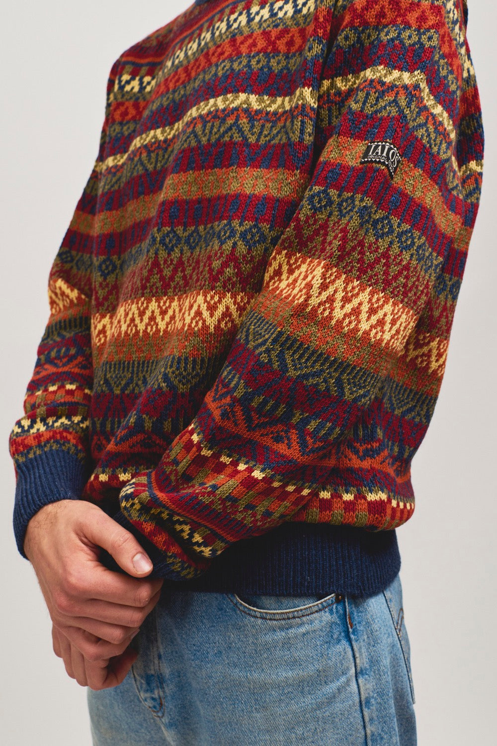 Jersey IAIOS de punto colorido con tonos cálidos de otoño