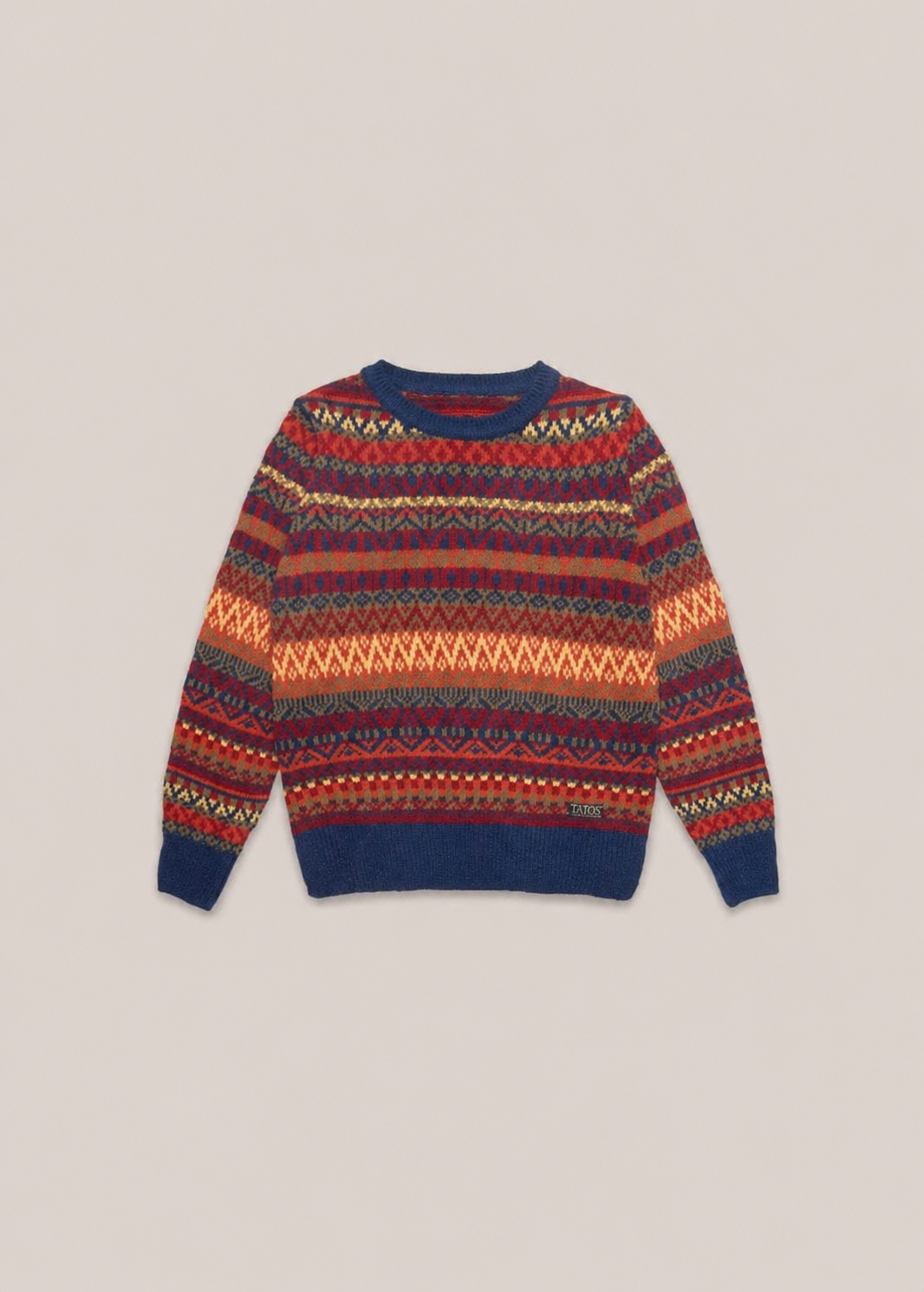Jersey de punto para mujer con diseño geométrico en varios colores, look cálido y moderno.
