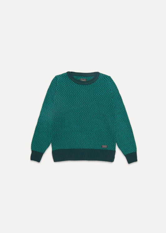 Jersey IAIOS unisex verde con diseño zigzag, moda sostenible, fotografía en plano (flat lay), hecho en Catalunya (España) con hilo reciclado.