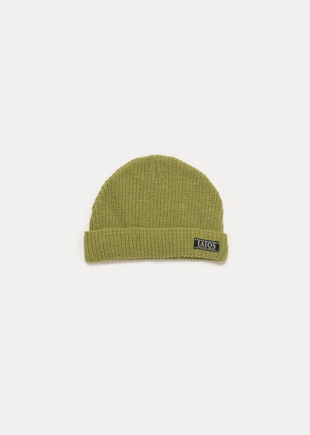 Pistachio green beanie for winter. It is a basic and plain hat.