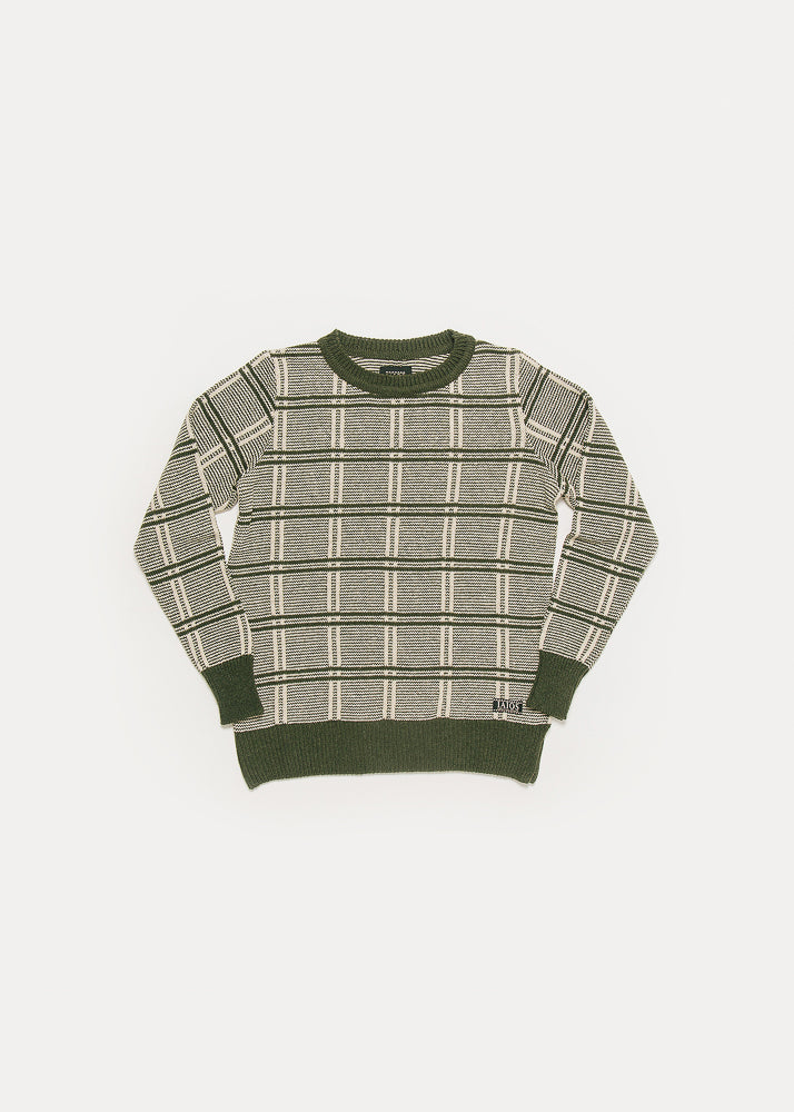 Green sweater for women or unisex. The Isidro sweater is the typical grandfather sweater and we love it. It is a jacquard that makes a very typical checkered shirt. 