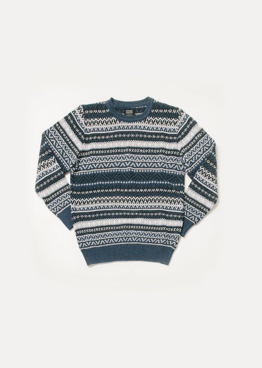 Jersey de punto de hombre o unisex. Este jersey de tonos azules es un jacquard de 5 tonos de azul por lo que se consigue un resultado de jersey muy navideño.
