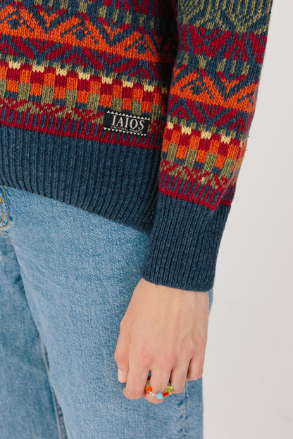 Detall del baix del jersei on podem veure l'etiqueta de iaios