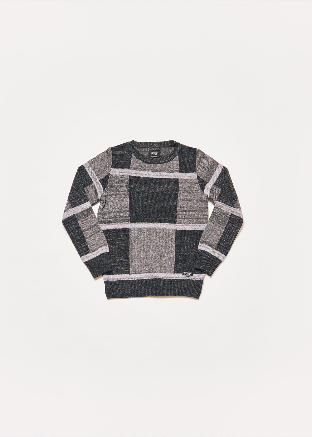 Women's or unisex knitted sweater in gray tones. It is a fairly large gray and black squares. 
