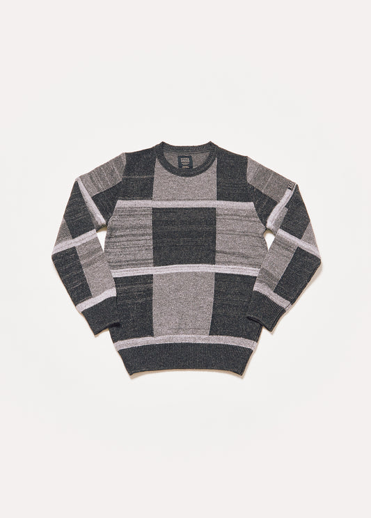 Men's or unisex knitted sweater in black and gray. It is a fairly large black and gray squares.