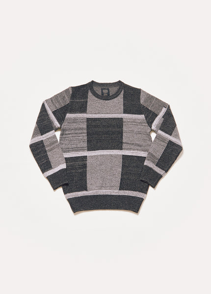 Men's or unisex knitted sweater in black and gray. It is a fairly large black and gray squares.