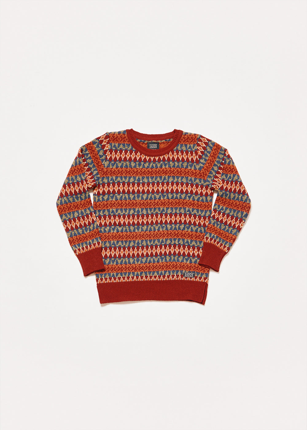 Jersey de punto de mujer o unisex de tonos rojos y verdes. Es un jacquard de 5 colores por lo que se consigue un resultado de jersey navideño. 