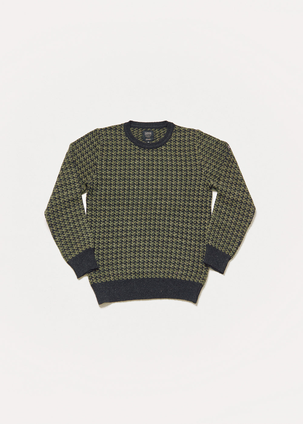 Jersey de punto de hombre o unisex de color verde y negro. Es un jacquard de 2 colores basado en un patron en forma de ola que se repite. 