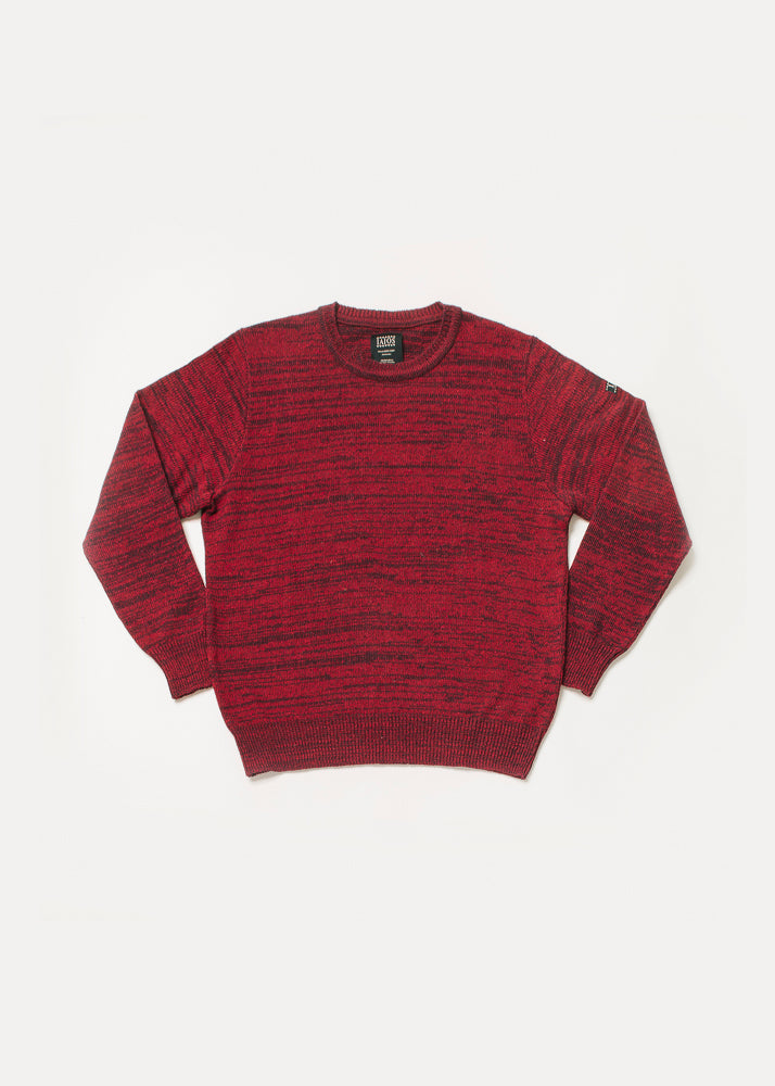 Jersey de hombre o unisex color rojo con textura de torzal. El torzal es una técnica que torsiona dos hilos de diferentes colores en uno y que al tejerse hace un efecto jaspeado muy bonito. 