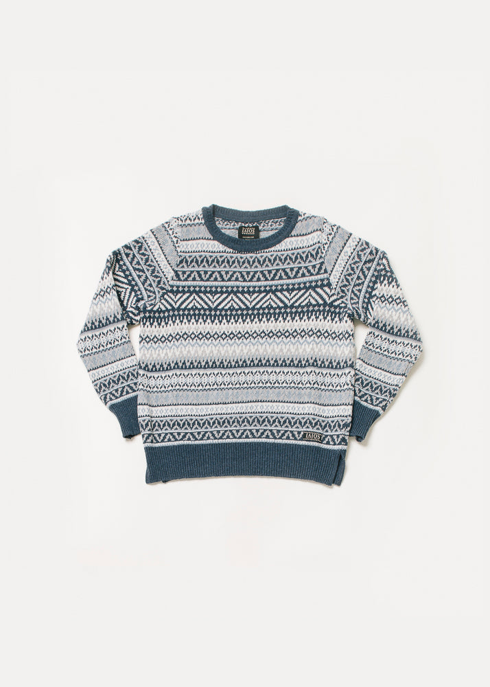 Jersey mujer o unisex de tonos azules. Es un jacquard de 5 colores que está inspirado en los jerseys nórdicos. 